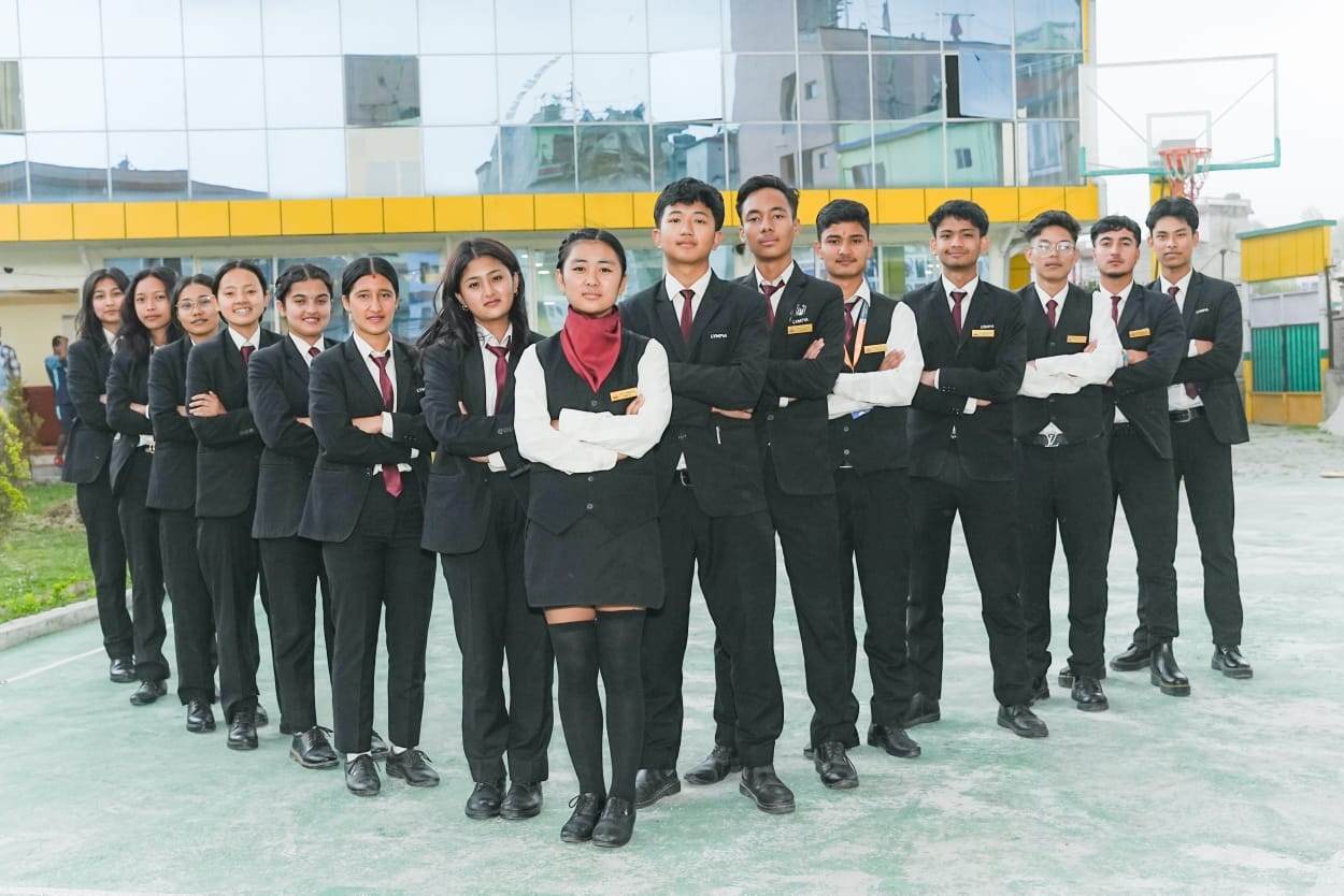 Lympia College students in uniform standing together
